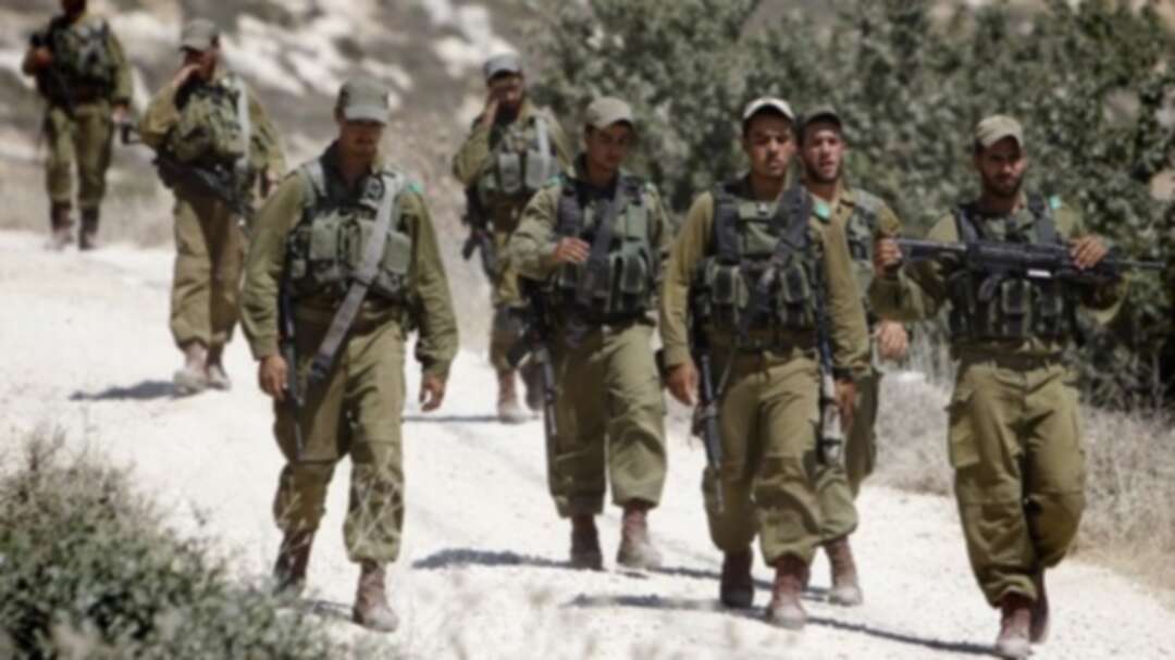 Israel hits two members of Palestinian security forces, speaks about an error.