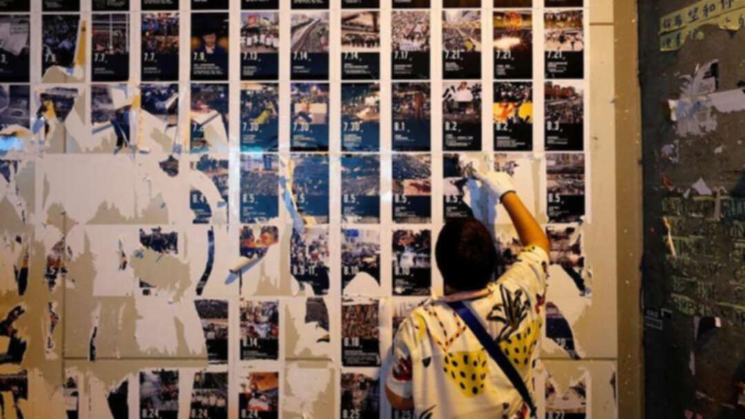 Pro-Beijing groups tear down Hong Kong’s protest walls, raising risk of clashes