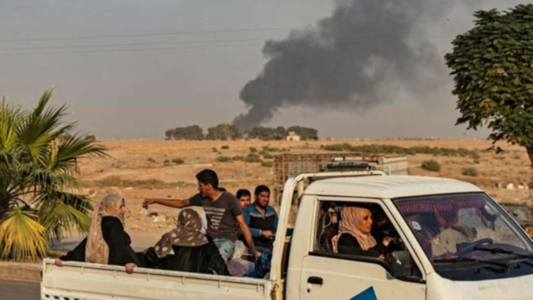 Thousands flee Turkish bombardment on Syria border