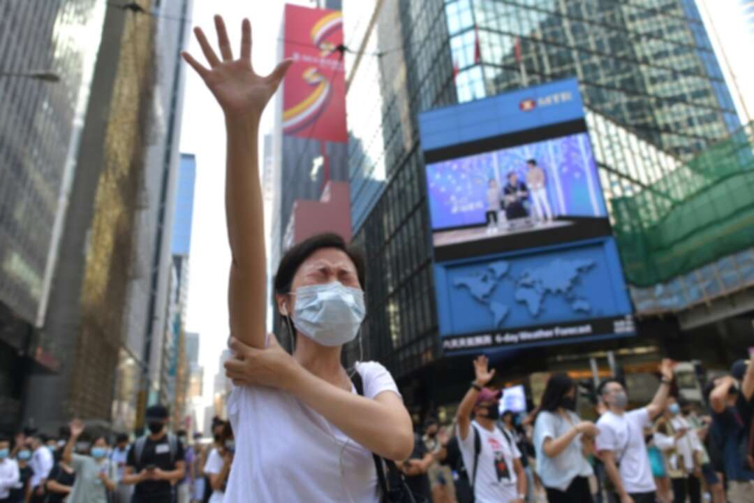 Hong Kong leader invokes emergency powers to ban protester face masks
