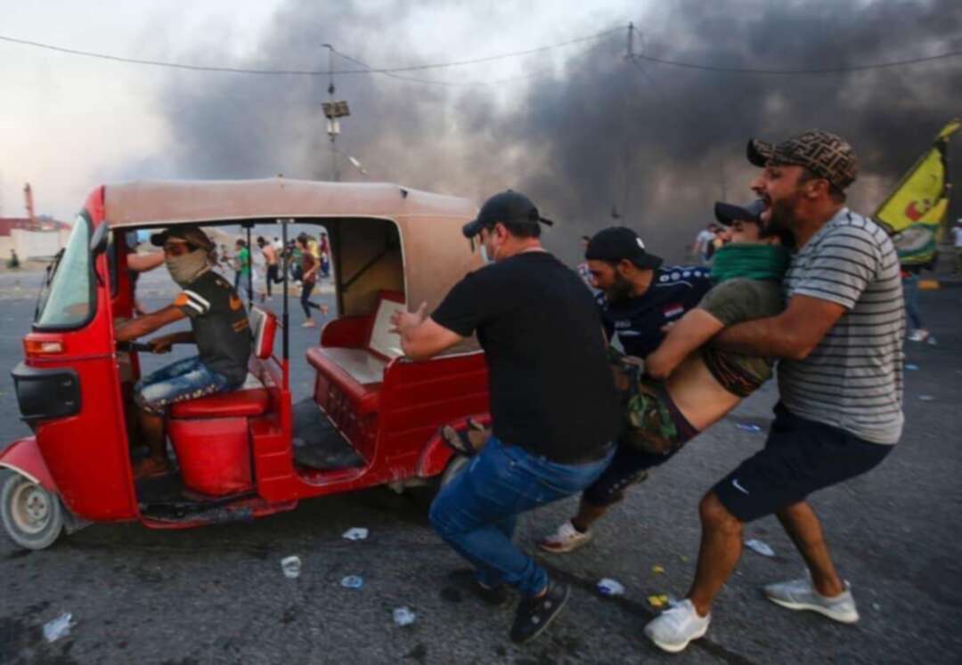 الحكومة العراقية تتهم طرف ثالث يقوم بقتل المتظاهرين