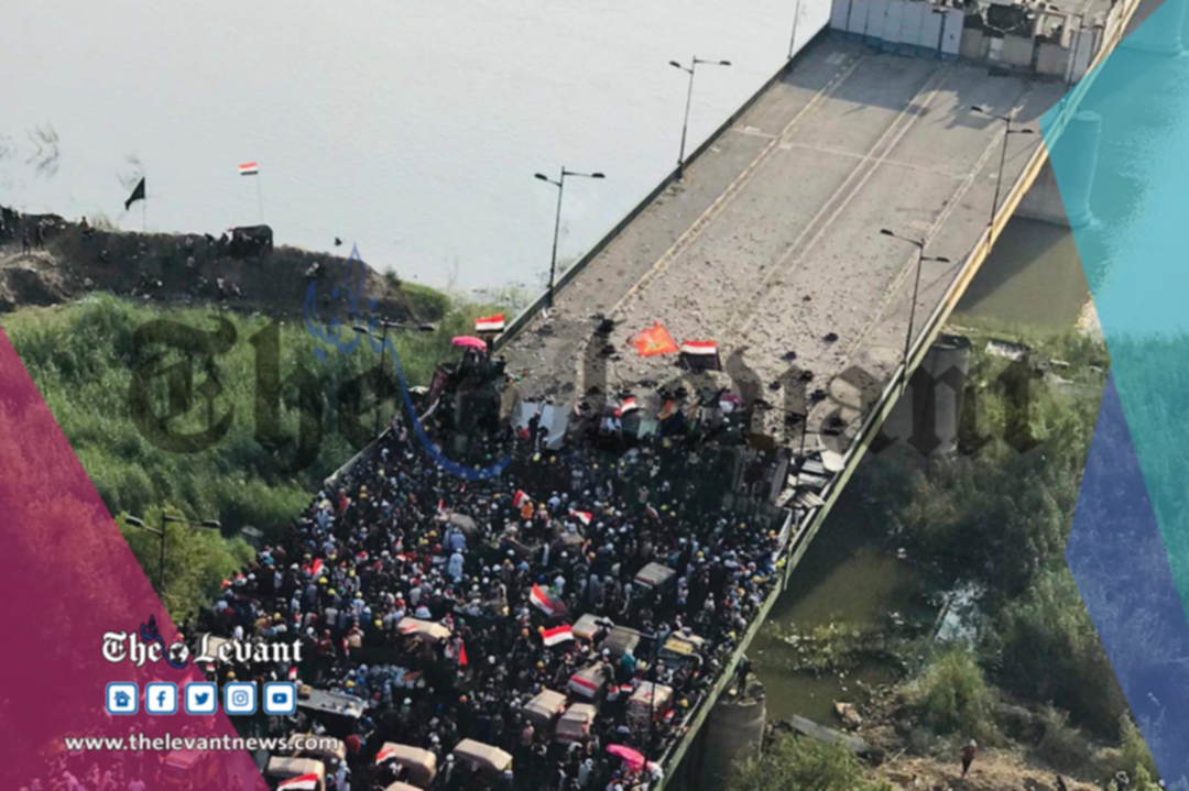 كرّ و فرّ  بين المتظاهرين العراقيين والقوات الأمنية للسيطرة على جسر الأحرار