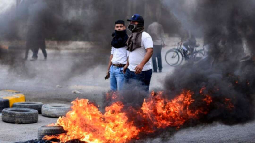 Iraqi protesters block roads, bridges in southern city of Najaf