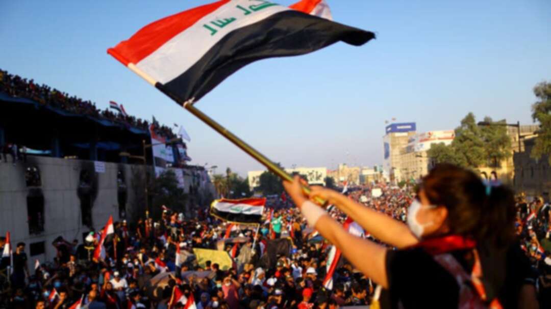 US urges early Iraq elections, halt to violence against protesters