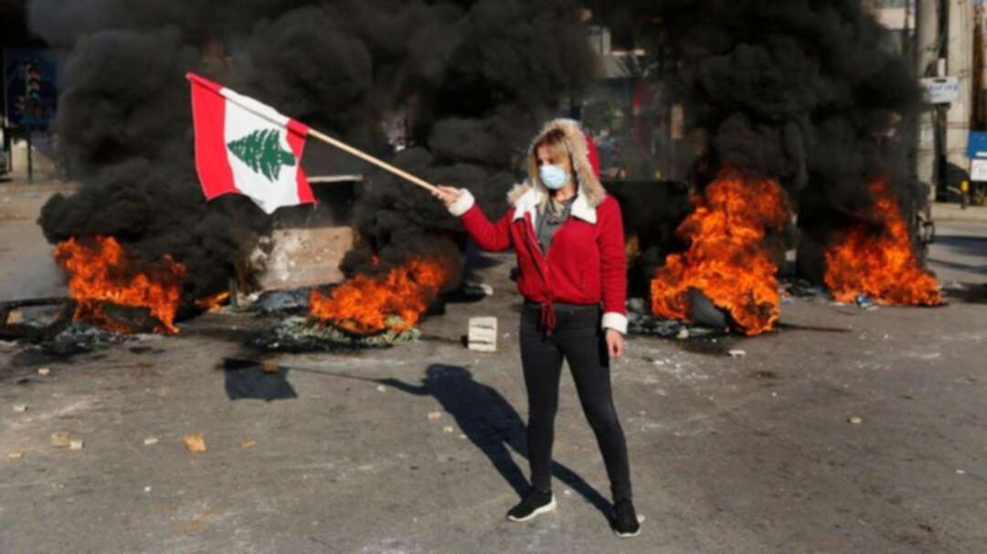 Lebanese anti-government protesters block roads again