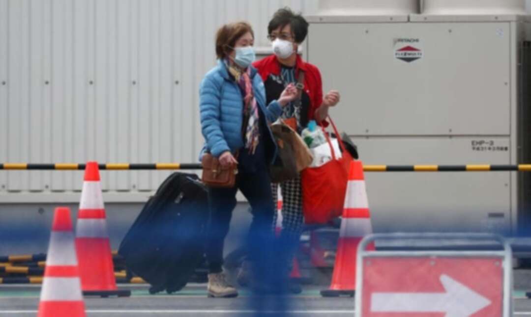 Virus-hit cruise ship passengers disembark in Japan after two-week quarantine