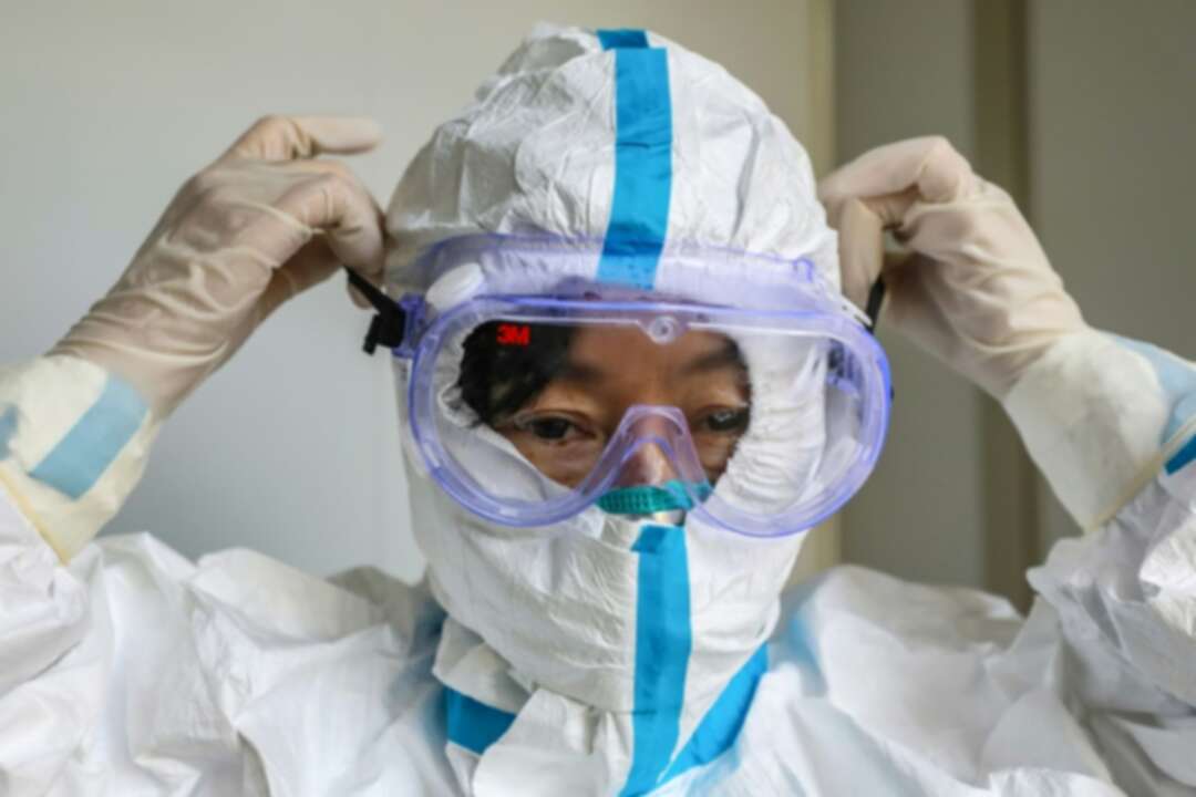China says 'urgent' need for medical equipment as virus toll tops SARS