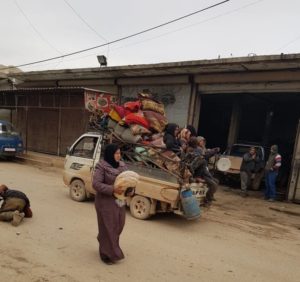 A family flees their home by car in Idlib province. (MSF)