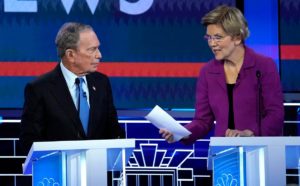 Former New York City Mayor Mike Bloomberg talks with Senator Elizabeth Warren at the ninth Democratic 2020 US Presidential candidates debate in Las Vegas Nevada. (Reuters)
