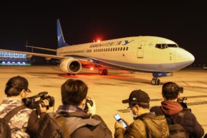 Journalists waiting as a plane of Xiamen Airlines carrying Hubei residents arrives from the Thai capital Bangkok. (AFP)Journalists waiting as a plane of Xiamen Airlines carrying Hubei residents arrives from the Thai capital Bangkok. (AFP)
