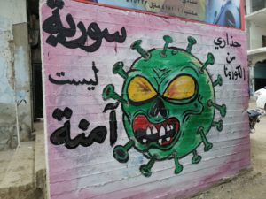 A mural which reads “Syria isn’t safe” in Idlib by Aziz Asmar. (Mohamad Jamalo)