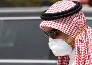 A Saudi man wearing a protective mask as a precaution against COVID-19 coronavirus disease in Riyadh on March 15, 2020. (AFP)