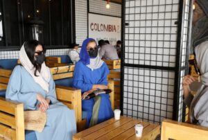 Young Saudi women sit in a cafe at Abha High City. (Reuters)