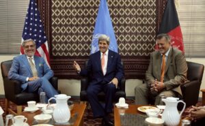 Then-US Secretary of State John Kerry, center, talks as Afghan presidential candidate Abdullah Abdullah, left, and Jan Kubis, the UN Secretary-General's special representative, right, listen during a meeting at the US embassy in Kabul, Aug. 8, 2014. (AP)