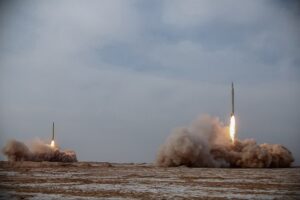 This handout photo provided on January 16, 2021, shows a launch of missiles during a military drill in an unknown location in central Iran. (SEPAH NEWS/AFP)