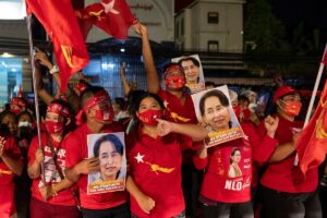 Supporters of National League for Democracy celebrate at party headquarters after the general election in Yangon, Myanmar, on November 9, 2020. (Reuters)
