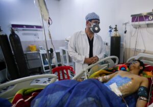 A man is treated at a hospital after he was injured during a rocket attack on U.S.-led forces in and near Erbil International Airport, in Erbil. (Reuters)