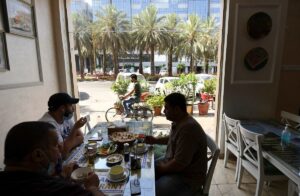 People sit at restaurant in Dubai amid strict rules to combat the coronavirus pandemic. (File photo: AFP)