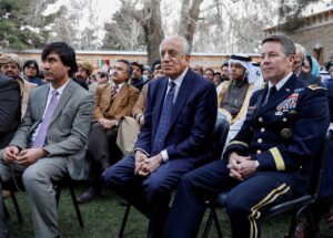 US envoy for peace in Afghanistan Zalmay Khalilzad (C) and US Army General Scott Miller, commander of NATO’s Resolute Support Mission and United States Forces in Afghanistan, attend Afghanistan’s President Ashraf Ghani’s inauguration as president, in Kabul, Afghanistan, on March 9, 2020. (Reuters)