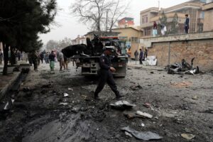 Security personnel inspect the site of a bomb attack in Kabul, Afghanistan, Saturday, Feb. 20, 2021. Three separate explosions in the capital Kabul on Saturday killed and wounded numerous people an Afghan official said. (AP)