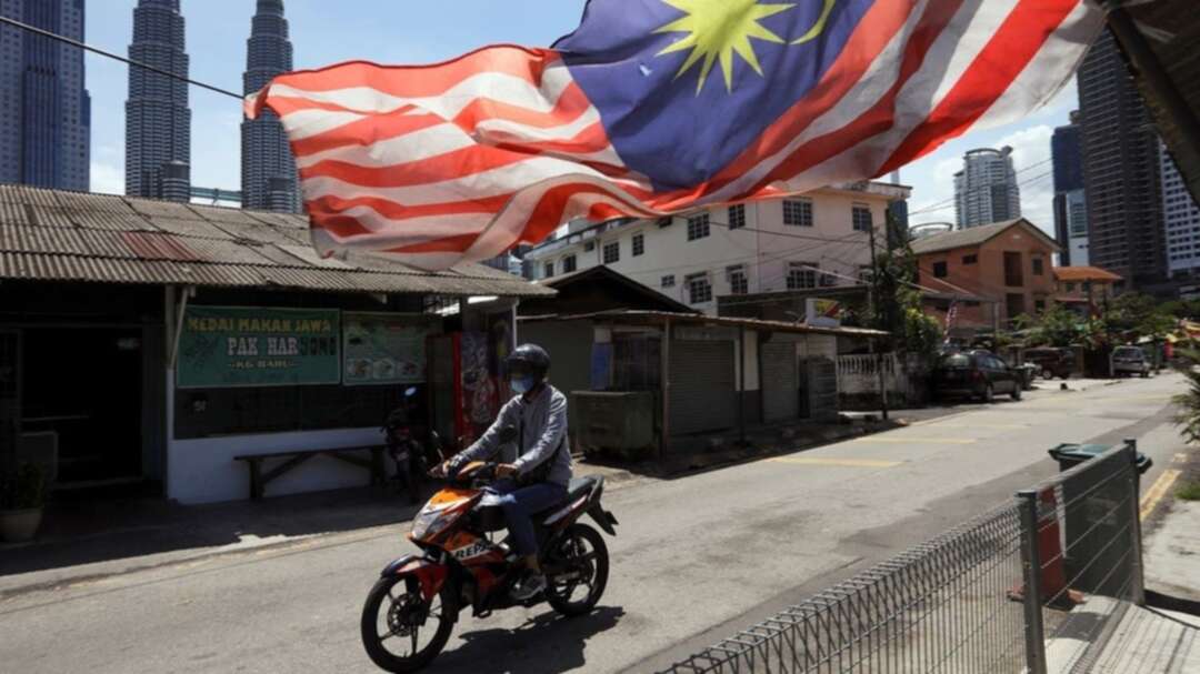 Malaysia defends new coronavirus fake news law amid free speech outcry