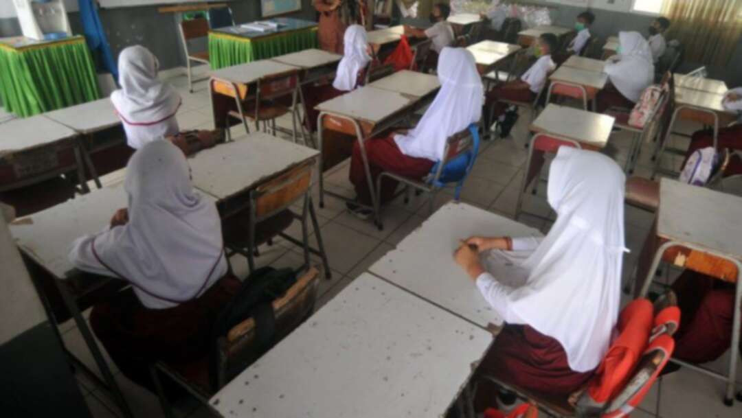 في إندونيسيا.. الفتيات يواجهن ضغوطاً لارتداء الحجاب