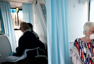 A woman receives a dose of the Oxford-AstraZeneca COVID-19 vaccine in Thamesmead, London, Britain. (Reuters)