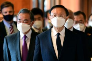 Yang Jiechi (R), director of the Central Foreign Affairs Commission Office for China and Wang Yi (L), China's Foreign Minister arrive for a meeting with US counterparts at the opening session of US-China talks at the Captain Cook Hotel in Anchorage, Alaska on March 18, 2021. (File photo: AFP)