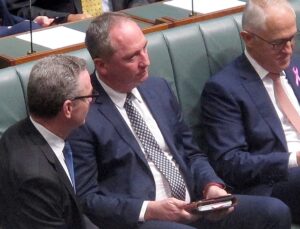 Former deputy Prime Minister Barnaby Joyce (center) ran into political strife in 2018 over revelations that he had impregnated a female staffer, who is now his partner, in an extramarital affair. (AP)