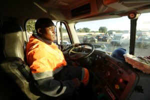 Molly Manatse a female truck driver is seen on the road in Harare, in this Saturday, March, 6, 2021 photo. (AP)