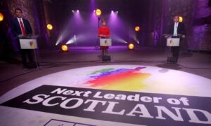 The Scottish Labour leader, Anas Sarwar, the first minister and leader of the SNP, Nicola Sturgeon, and the Scottish Conservative party leader, Douglas Ross, take part in a debate in Glasgow.