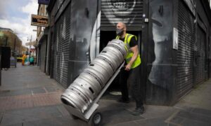 Barrels of beer from Brixton Brewery are delivered to a bar in Brixton.