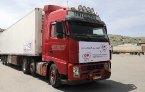 A truck carrying vaccines against the coronavirus disease (COVID-19) is seen at Bab al-Hawa crossing at the Syrian-Turkish border, in Idlib governorate, Syria, on April 21, 2021. (Reuters)