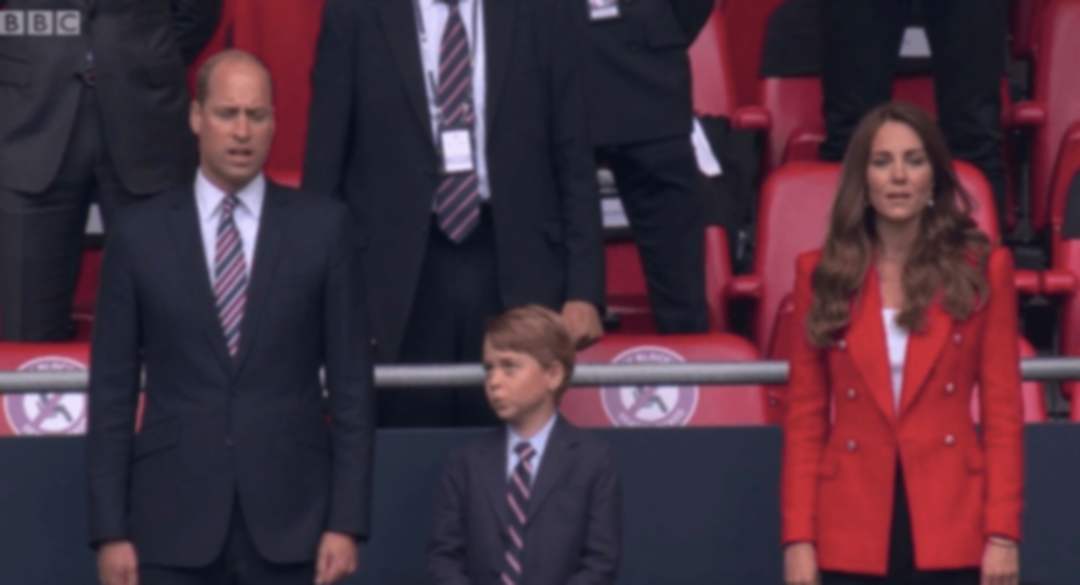 Prince George attends England football game with his parents