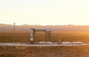 Blue Origin's New Shepard rocket and capsule stand atop the company's Launch Site One near Van Horn, Texas ahead of a planned launch of founder Jeff Bezos and three others on July 20, 2021. (Image credit: Blue Origin)