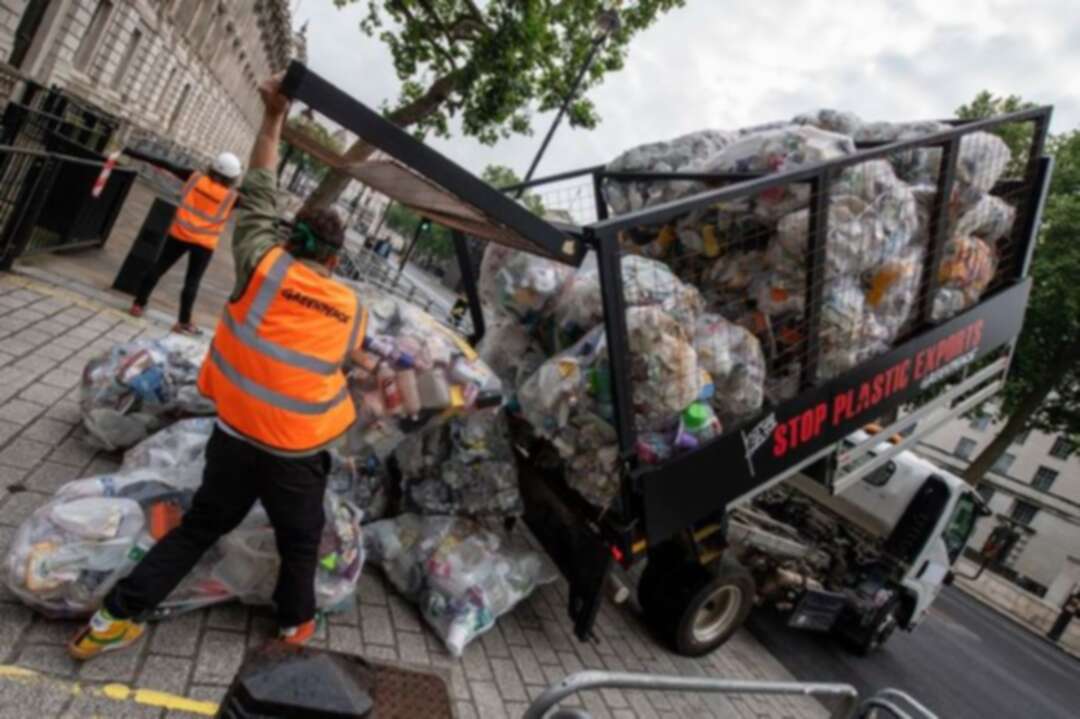 Greenpeace protests against England ditching its trash overseas