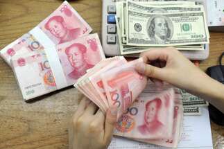 الصين تحدّد سعر صرف اليوان عند 6.4785 دولار