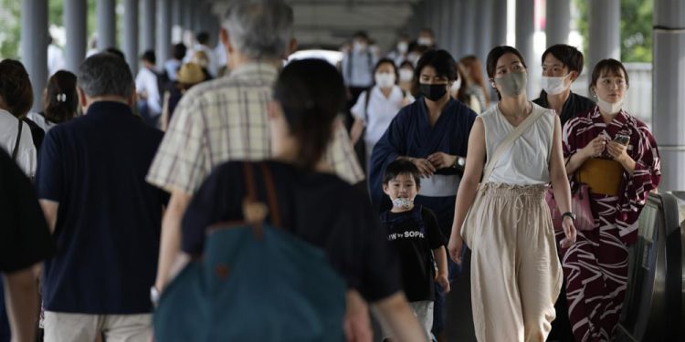 People wearing protective masks in Japan