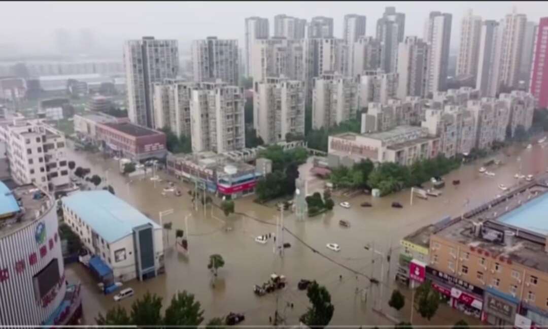 Five Chinese cities declare rain 'red alerts' after flood death toll hits 21