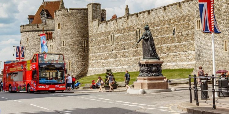 People riding the bus in one of England's cities 