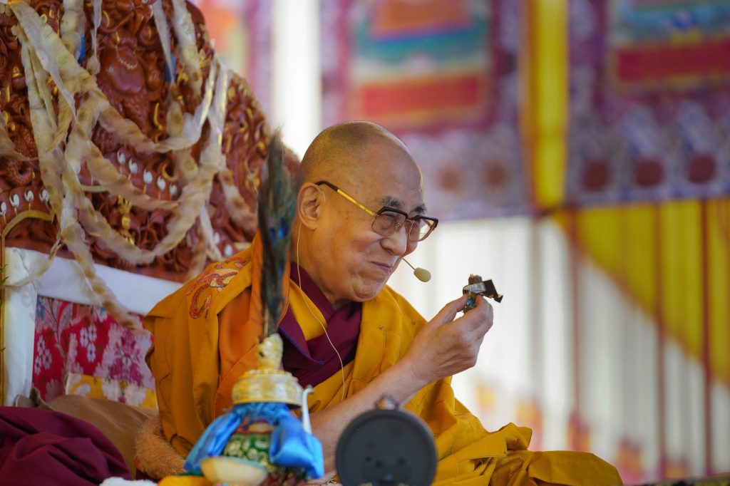 Dalai Lama enjoying a chocolate during a break as he gives the Avalokiteshvara Empowerment in Manali, HP, India on August 17, 2019/Official Fscebook page/Image Credit: Photo by Tenzin Choejor
