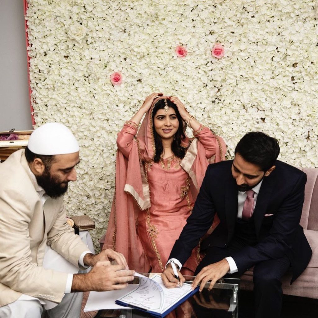Malala Yousafzai with her groom signing marriage paper/Facebook page