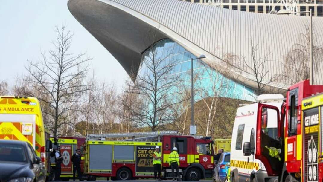 Emergency crews and vehicles are pictured outside the Queen Elizabeth Olympic Park following a leak of noxious fumes, in London, Britain March 23, 2022. REUTERS/Henry Nicholls
