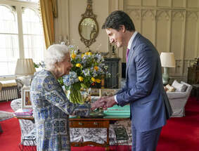 Queen Elizabeth II greets Canadian PM in person after COVID-19 scare