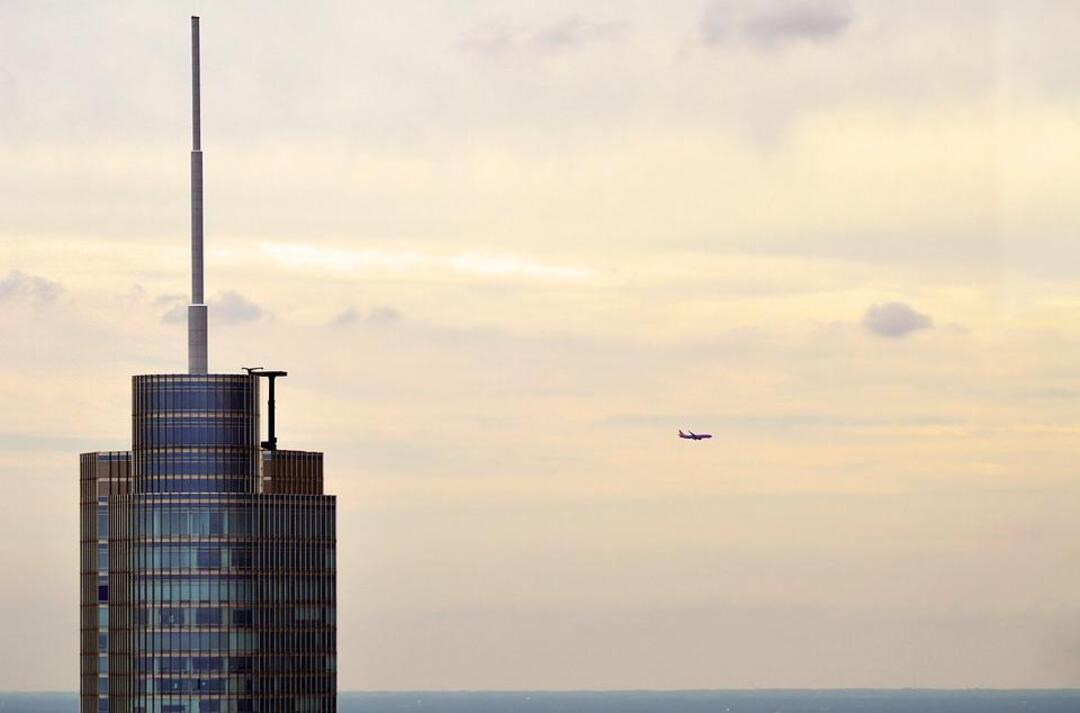 US man arrested for opening door and walking on wing as jet taxis