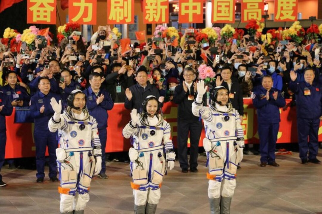 (L-R) Astronauts Ye Guangfu, Wang Yaping and Zhai Zhigang before departure. (File photo: Arab News via AFP)