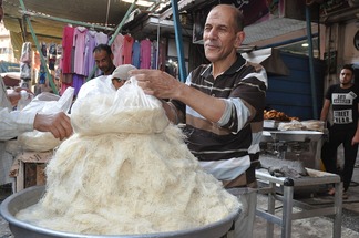 Ramadan communal meals return to Cairo streets after coronavirus suspension
