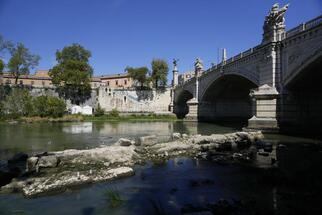 Italy’s drought exposes ancient imperial bridge over Tiber