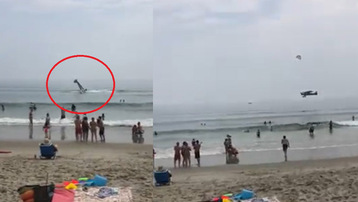 تحطم طائرة صغيرة على شاطئ مزدحم بالمصطافين