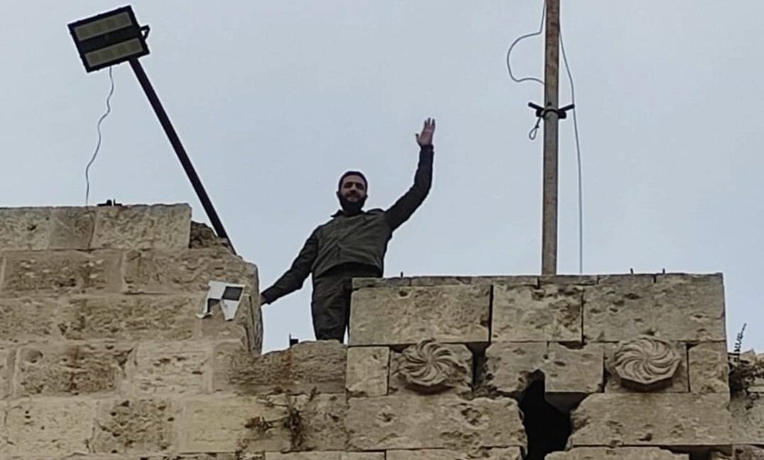 HTS Leader Visits Aleppo Citadel and Waves to Surrounding People